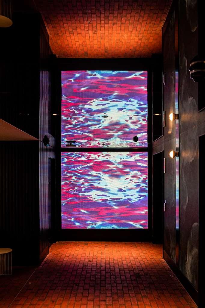 Qt Newcastle Hotel Beltér fotó The 10-metre-high (33 ft) glass wall in the foyer